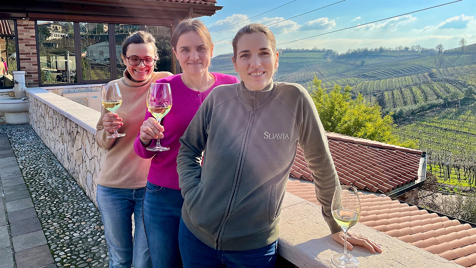 A portrait of Tessari sisters Meri, Valentina and Alessandra, from left to righ, in front of Suavia winery.
